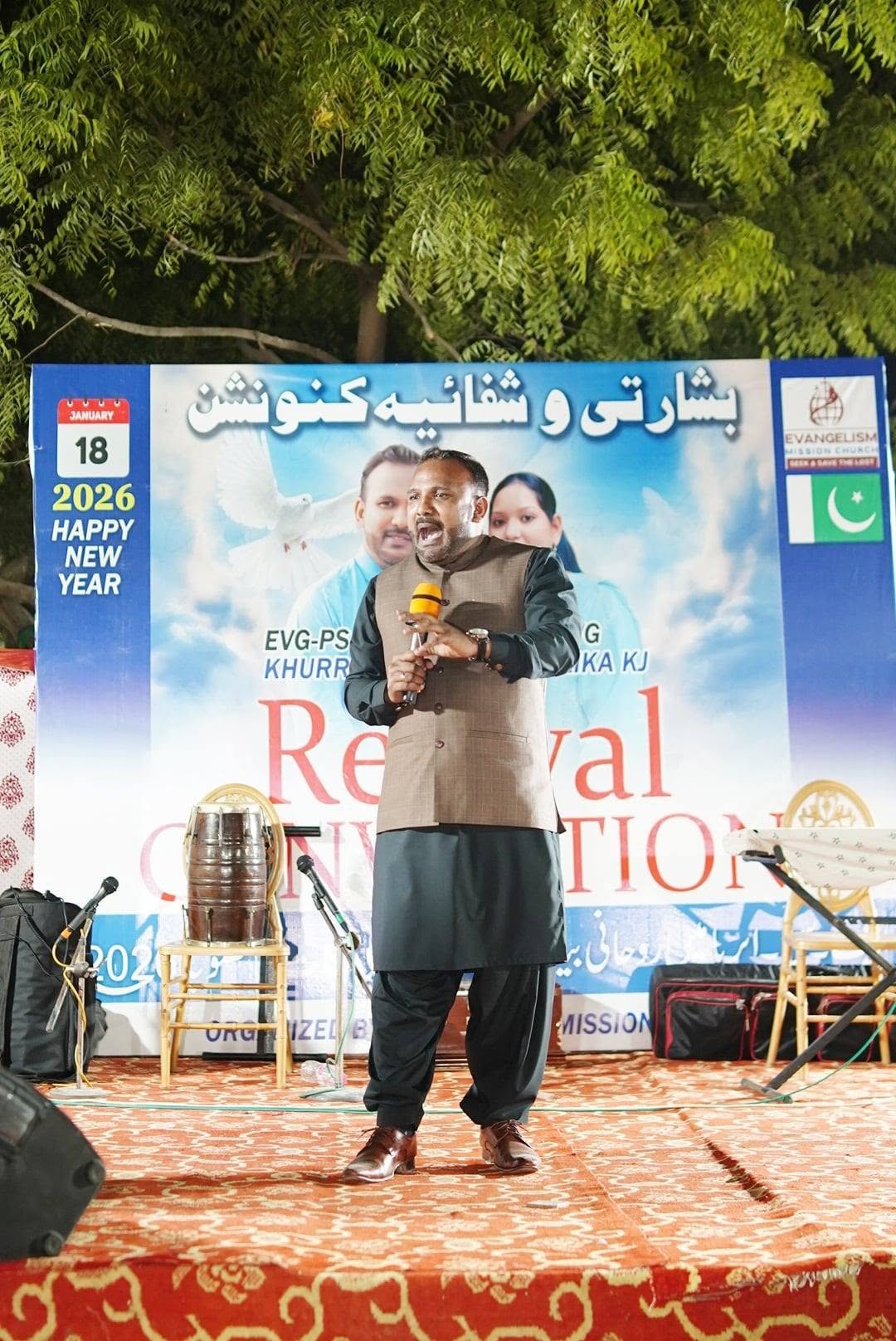 An evangelist preaching at a revival convention