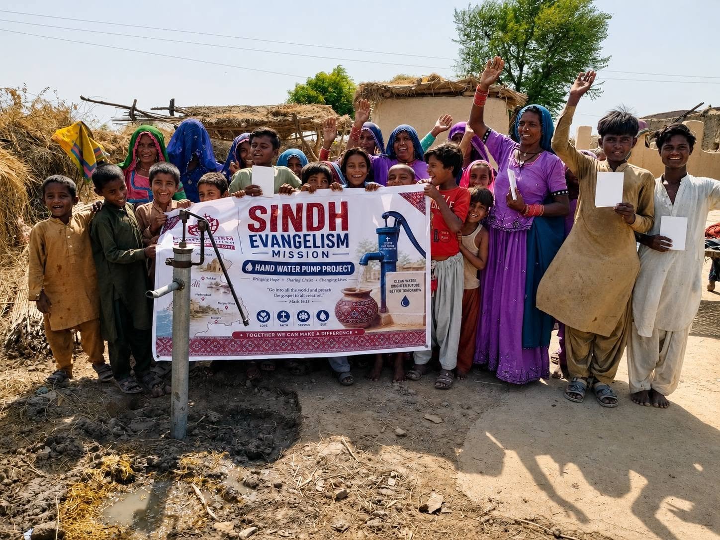 The community celebrating a new water pump